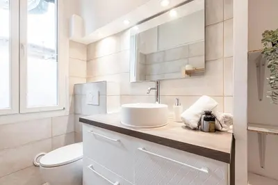 a bathroom with a sink and a toilet at Lovely 1 Bdr in Harbor Area in Nice