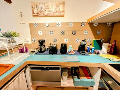 a kitchen with a blue counter top with appliances on it at St Joseph · Great holiday flat - old town for 4 in Nice