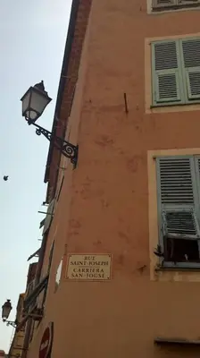 a building with a street light and a sign on it at St Joseph · Great holiday flat - old town for 4 in Nice