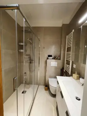 a bathroom with a shower and a toilet and a sink at Ezevacances Studio Capuccino vue mer 5 mn plage 7 mn gare Wifi in Èze