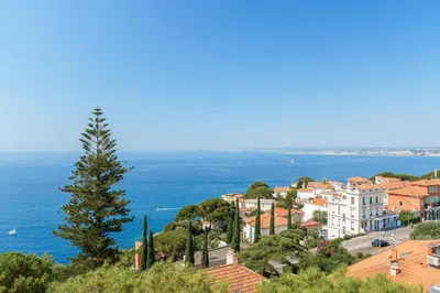 a view of a city and the ocean at Balcon sur la Méditerranée in Nice