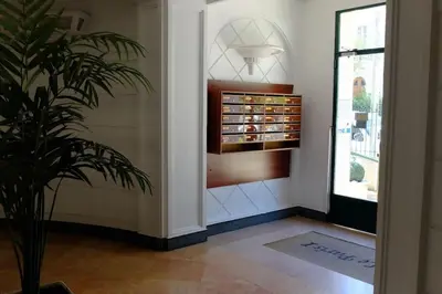 a room with a potted plant next to a door at #7 What else ? Your own quiet terrace in Nice center 10min to Beach in Nice