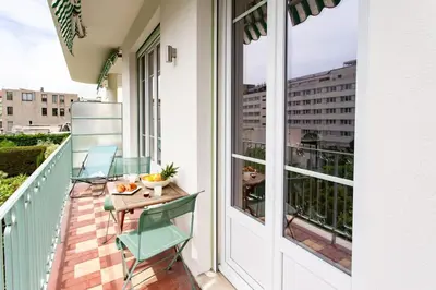 a balcony with chairs and a table on a balcony at #7 What else ? Your own quiet terrace in Nice center 10min to Beach in Nice