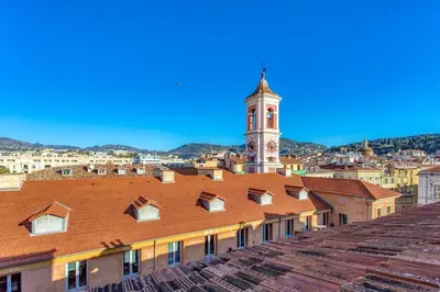 a view of a city with a clock tower at #9 Opera's Duplex panoramic Sea View Terrace & AC 1min to Beach in Nice