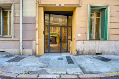 an entrance to a building with doors open at #14 Duplex Tonduti terrace 5min Old Town in Nice
