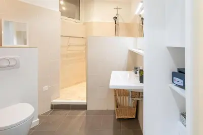 a bathroom with a toilet and a sink and a shower at #28 1 BDR Flat AC Balcony Hper Central 10mins to Beach & old town in Nice