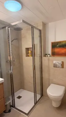 a bathroom with a shower and a toilet at Very cosy flat in heart of Old Town of Nice near beach in Nice