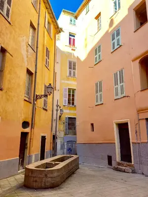 an alley in an old town with buildings at Very cosy flat in heart of Old Town of Nice near beach in Nice