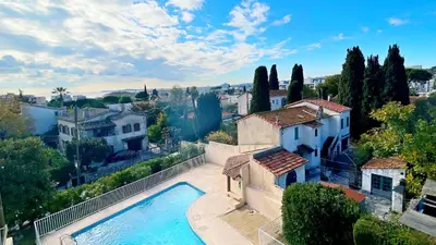 an aerial view of a house with a swimming pool at Eden Beach in Cagnes-sur-Mer