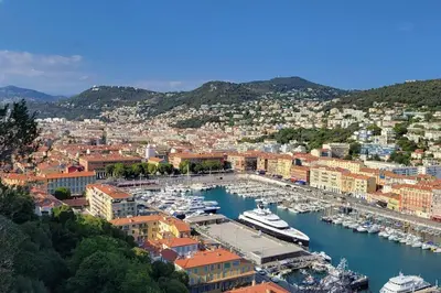 a view of a harbor with boats in the water at Renovated Apartment Near the Beach in Nice