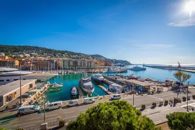a harbor with boats in the water in a city at Sea view, vue sur la mer Port De Nice - Appartement de charme 2 P in Nice