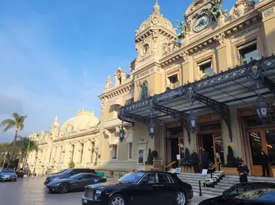 two cars parked in front of a building at Nice & Les Cypres in Nice