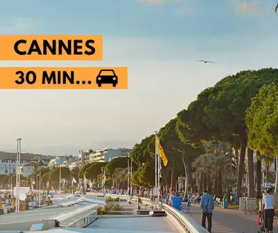 a sign that reads games min on a beach at Lumineux, tout confort, Wifi & Terrace & Parking in Saint-Laurent-du-Var