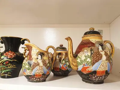 a group of four vases sitting on a shelf at LOFT LUXE et GLAMOUR ! NICE CENTRE. in Nice