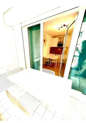 a drawing of a room with a table and chairs at Residence Californie in Nice