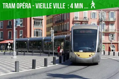 a bus driving down a street in a city at DUPLEX LE GESÙ - VIEILLE VILLE - CLIM - WIFI in Nice
