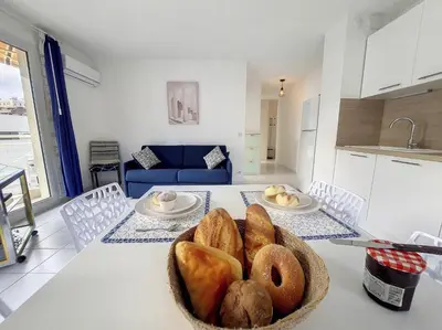 a table with a bowl of bagels on it at Nestor&Jeeves - VANINA - Central - Close sea in Nice