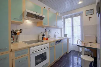 a kitchen with a sink and a stove at Maison Bianchi - Saint Philippe in Nice