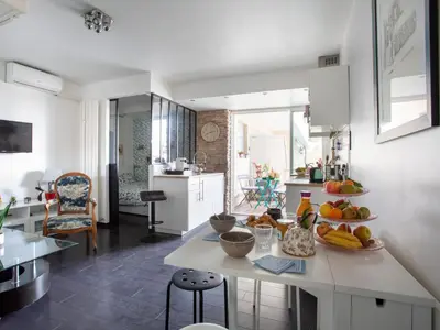a kitchen with a counter with fruit on it at Apartment Cros de Cagnes-1 by Interhome in Cagnes-sur-Mer