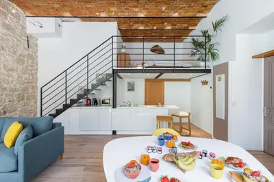 a living room with a white table with food on it at MY CASA - GUBERNATIS - Beautiful Duplex with terrace in Nice
