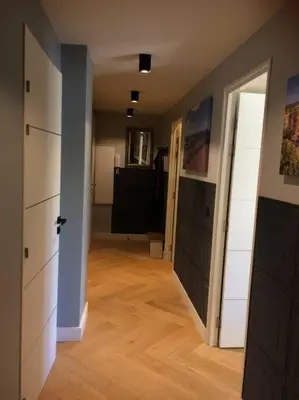 an empty room with a hallway with two doors at Lovely Refurbished Apartment in Nice