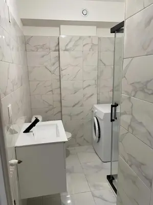 a bathroom with a toilet and a sink and a shower at Studio 50 m de la mer - Centre - Proche mer in Nice