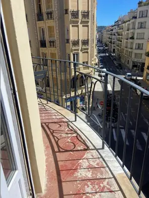 a balcony with a view of a street at Nice 56m with balcony in rotunda near the sea in Nice