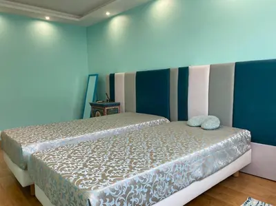 a bedroom with a bed in a room at Cagnes-sur-Mer, 50m de la mer, au calme in Cagnes-sur-Mer