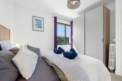 a bedroom with a bed with blue stuffed animals on it at Nice Renting - BELLET - Live A Dream Villa Pool 3 Bedroom Garden Parking in Nice