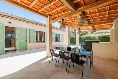 an outdoor patio with a table and chairs at Nice Renting - BELLET - Live A Dream Villa Pool 3 Bedroom Garden Parking in Nice