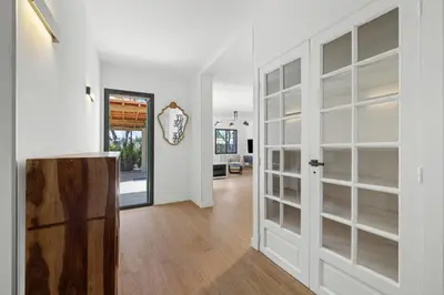 a room with white walls and a door with shelves at Nice Renting - BELLET - Live A Dream Villa Pool 3 Bedroom Garden Parking in Nice