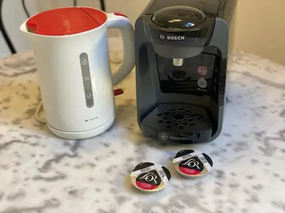 a coffeemaker next to a coffee maker on a counter at Nice Renting - BONAPARTE - Luxury Loft Trendy neighborhood - AC - fully equipped in Nice