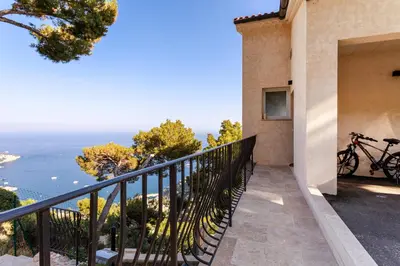 a balcony with a view of the ocean at Sea View Apartment with Private Secure Parking - 2 in Villefranche-sur-Mer