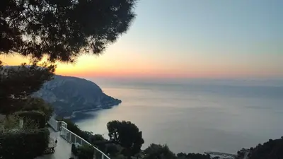 a view of the amalfi coast at sunset at Sea View Apartment with Private Secure Parking - 2 in Villefranche-sur-Mer