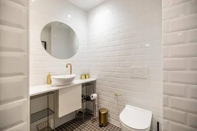 a white bathroom with a sink and a toilet at Chez Collette - Luxury in the Old Nice in Nice