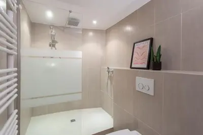 a bathroom with a shower and a toilet at L5 2mins Walk to the Beach Heart of Old Town Nice in Nice