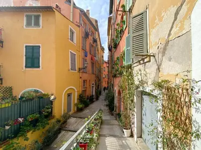 an alleyway between two buildings in an old town at L5 2mins Walk to the Beach Heart of Old Town Nice in Nice