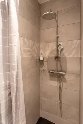 a shower with a shower curtain in a bathroom at L6 2Rooms 2mins walk from Negresco & Sea AC-Wifi in Nice