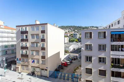 an aerial view of a building and a parking lot at L12 Port window 1Bedroom Wifi 5mins beach & Nice's Cap in Nice