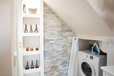 a laundry room with a washer and dryer at L16 Suite Malonat Vieux Nice 1 min Mer/ 2 chbres & AC in Nice
