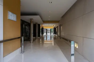 an empty hallway of a building with a long corridor at L18 Central Parking terrace AC 10mins walk to beaches in Nice