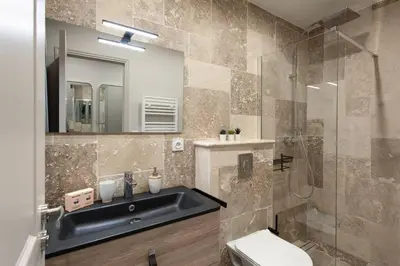 a bathroom with a sink and a shower at L19 1BDR Massena central 2mins Sea/PromenadeAC/Balcony in Nice