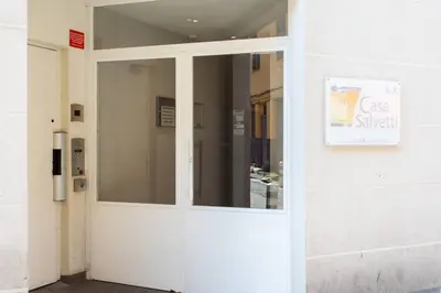 a glass door of a building with a sign on it at L44 1BDR Flat 10mins walk to port/Balcon, Parking, AC in Nice