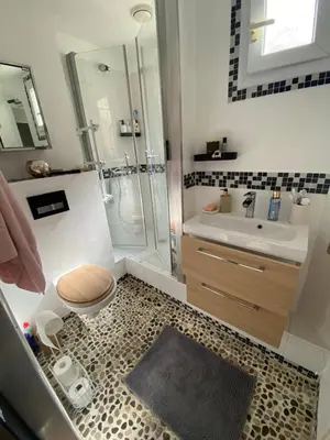 a bathroom with a shower and a toilet and a sink at Nice - Appartement T3 rénové de 50 M2 classé 2 étoiles in Nice