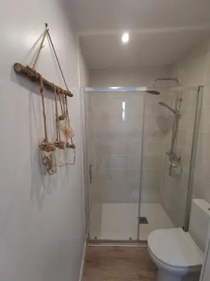 a bathroom with a shower and a toilet at Villa Soleil Levant in Nice